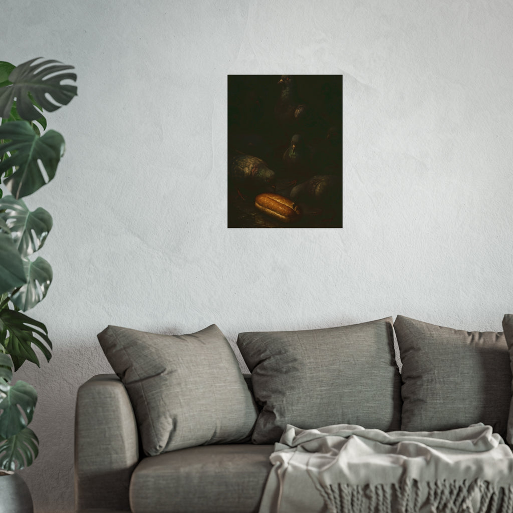 Pigeons crowding around a bread roll on dark stone paving. The Congregation at the Bun by Garabaggio, fine art print hanging in a room.