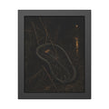 A bent bicycle wheel snagged in dry weeds on a dark riverbank. The Catching in Weeds by Garabaggio, framed fine art print, 11″ x 14″.