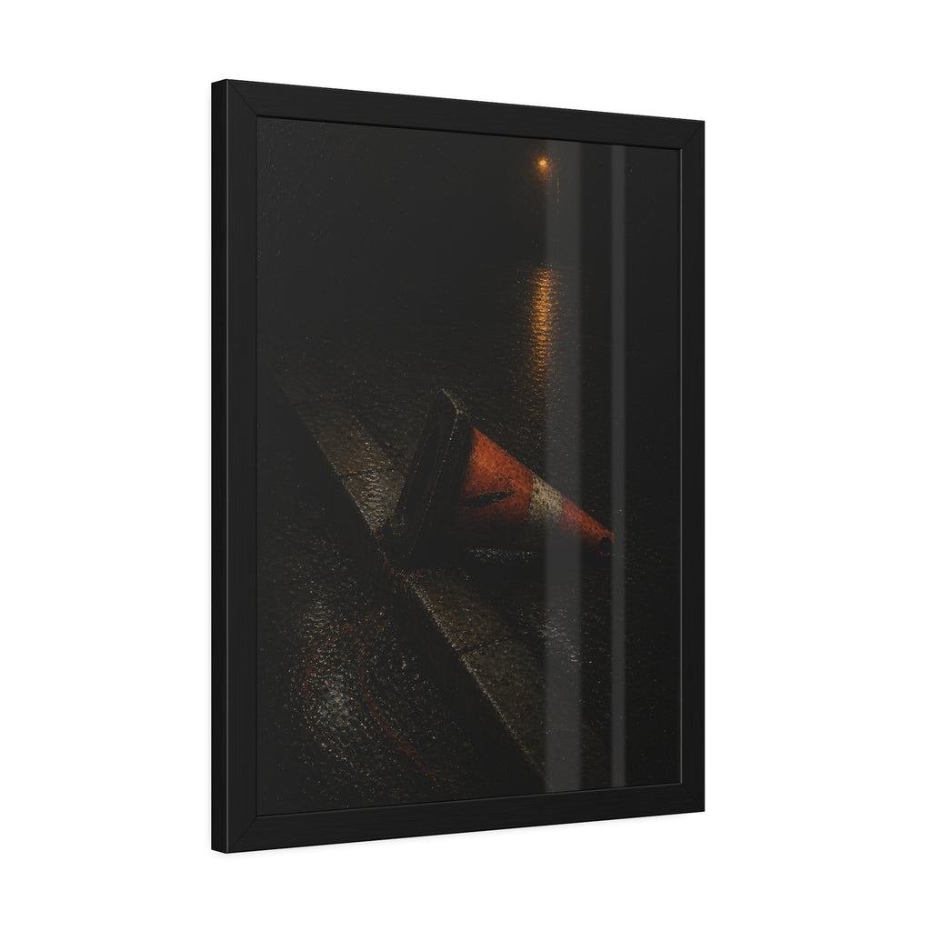 An orange traffic cone toppled on a wet curb under a distant streetlamp. The Dragging Through Rain by Garabaggio, framed fine art print hanging in a room.