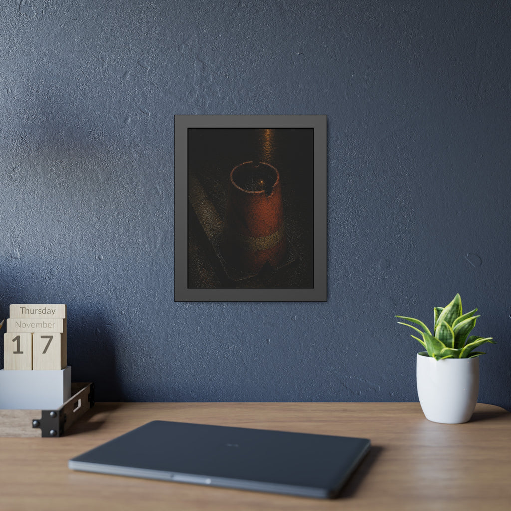 An upturned traffic cone holding rainwater at a wet curb under a lamp. The Cup of Rain by Garabaggio, framed fine art print hanging in a room.