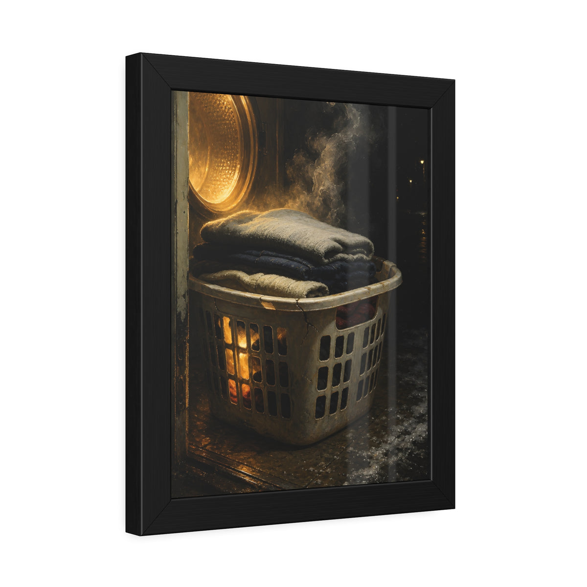 A laundry basket of folded clothes glowing in front of an open dryer. The Warm Clothes Against the Cold by Garabaggio, framed fine art print hanging in a room.