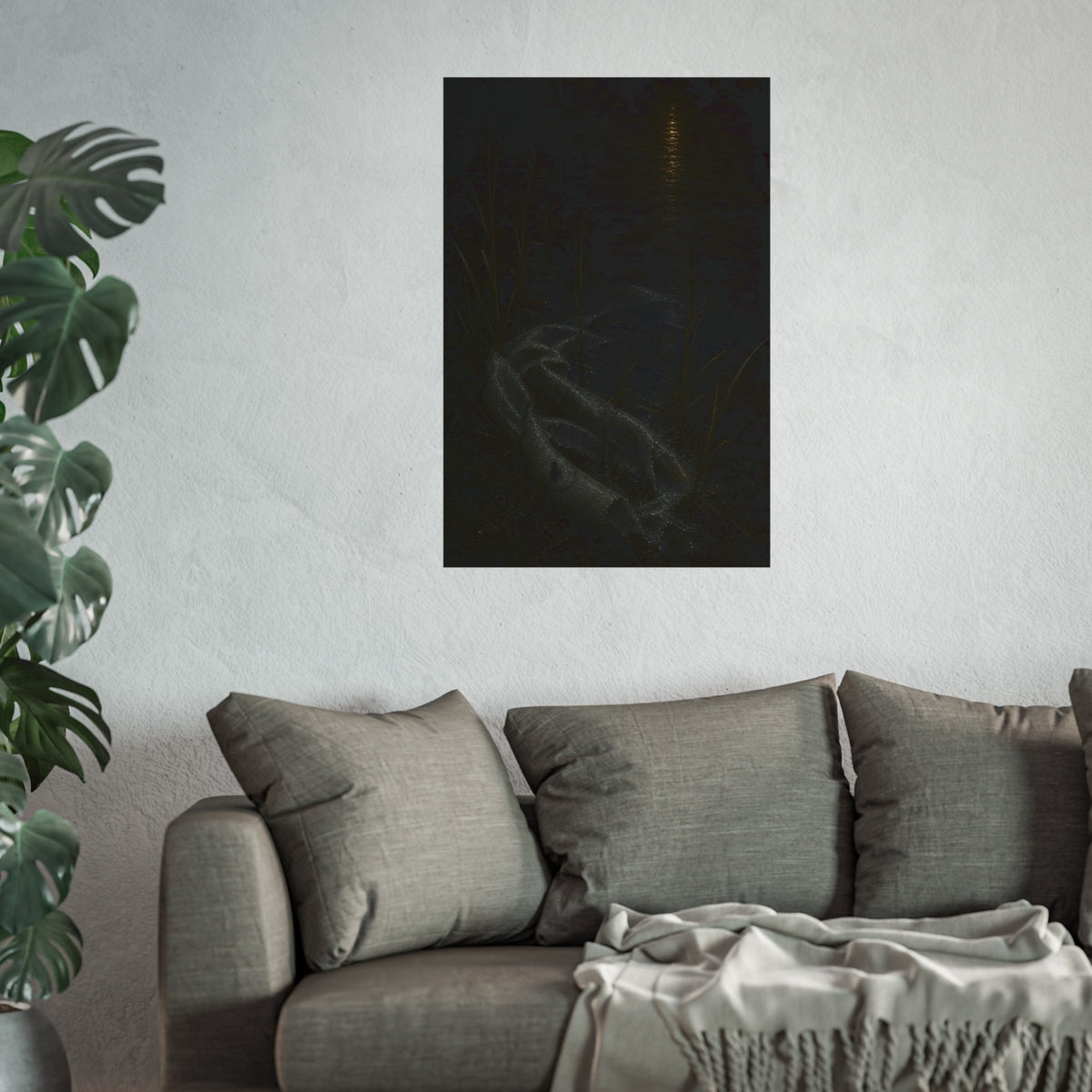 A deflated float slumped in lakeside reeds under a streak of moonlight. Spring Skin in the Reeds by Garabaggio, fine art print hanging in a room.