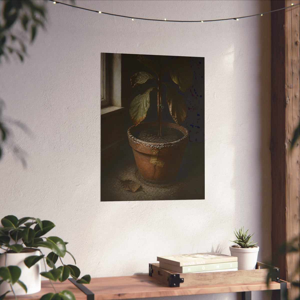 A drooping potted plant in a cracked terracotta pot beside a window. The Missed Watering by Garabaggio, fine art print hanging in a room.