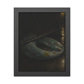 A deflated ring float pushed under a chain link fence in a wet alley. The Escape Beneath the Fence by Garabaggio, framed fine art print, 11″ x 14″.