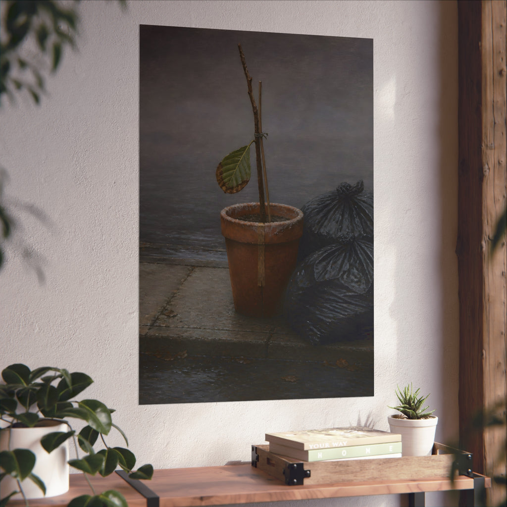 A potted dead twig with one leaf beside black garbage bags on a wet curb. The Curb on Tuesday by Garabaggio, fine art print hanging in a room.