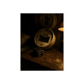 An open smoke detector on a wooden table beside a removed nine volt battery. The Silence After Removal by Garabaggio, fine art print, 12″ x 16″.
