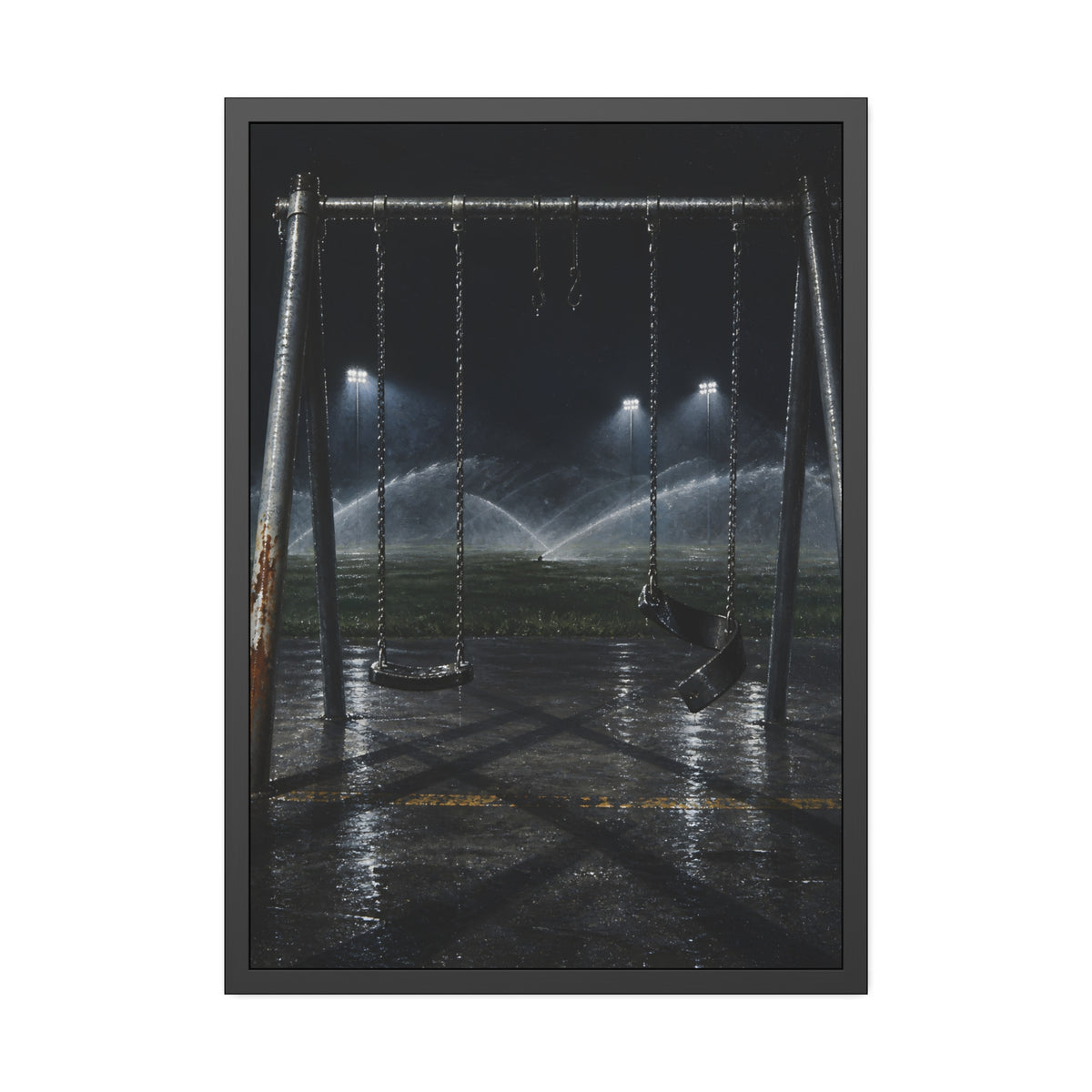 An empty swing set on wet asphalt, sprinklers arcing over the field. The Eleventh Hour: The Sprinklers by Garabaggio, framed fine art print, 28″ x 40″.