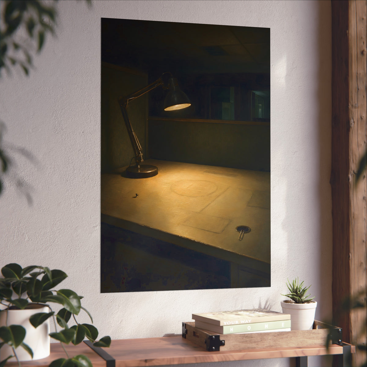 A lit desk lamp on an emptied office desk at night. The Desk Lamp Still Warm by Garabaggio, fine art print hanging in a room.