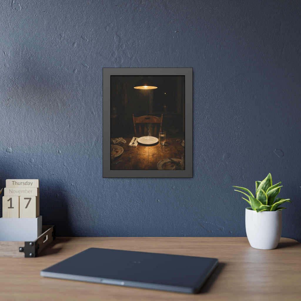 A clean plate and empty chair under a hanging lamp at a used dinner table. The Empty Seat at Dinner by Garabaggio, framed fine art print hanging in a room.