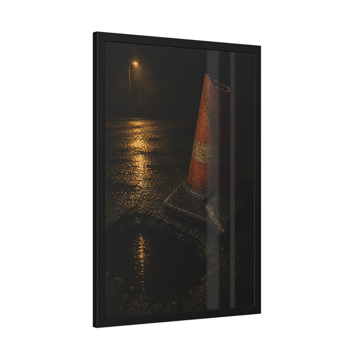 A traffic cone beside a water filled pothole reflecting a street lamp. The Sentinel of the Pothole by Garabaggio, framed fine art print hanging in a room.