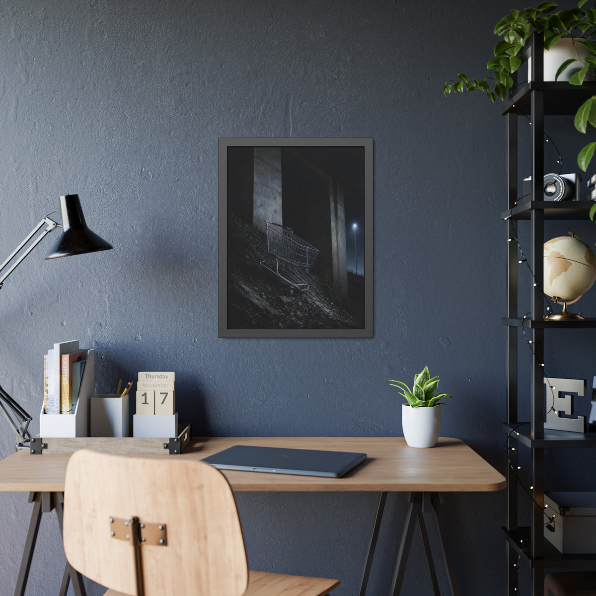 A shopping cart on a rocky slope under an overpass near a streetlamp. The Descent to the Underpass by Garabaggio, framed fine art print hanging in a room.