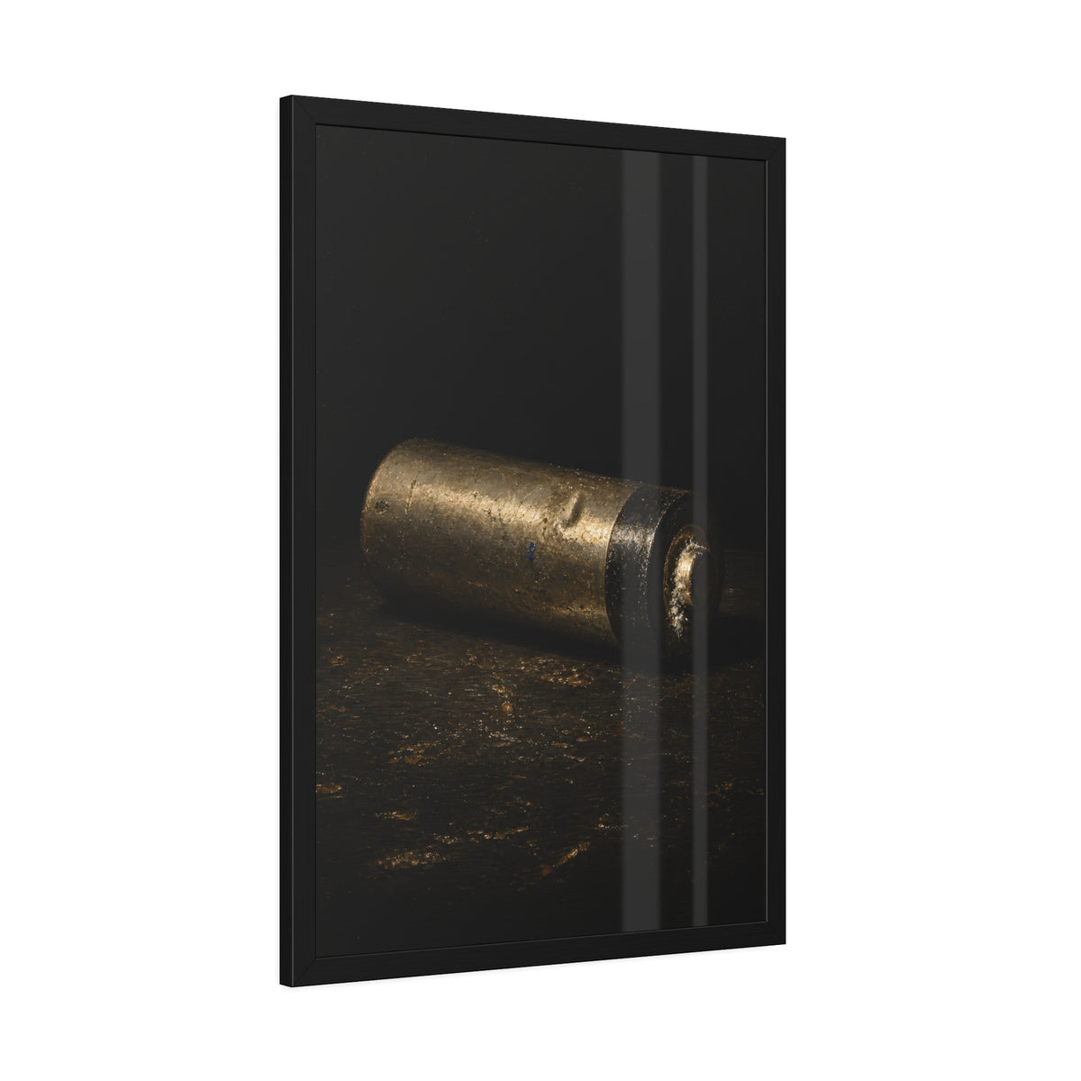 A corroded AA battery lying on a dark gritty surface in a single beam. The First Exhaustion by Garabaggio, framed fine art print hanging in a room.