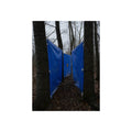 Blue tarps tied between bare trees forming a corridor over dead leaves. Passage Between Trees by Garabaggio, fine art print, 12″ x 16″.