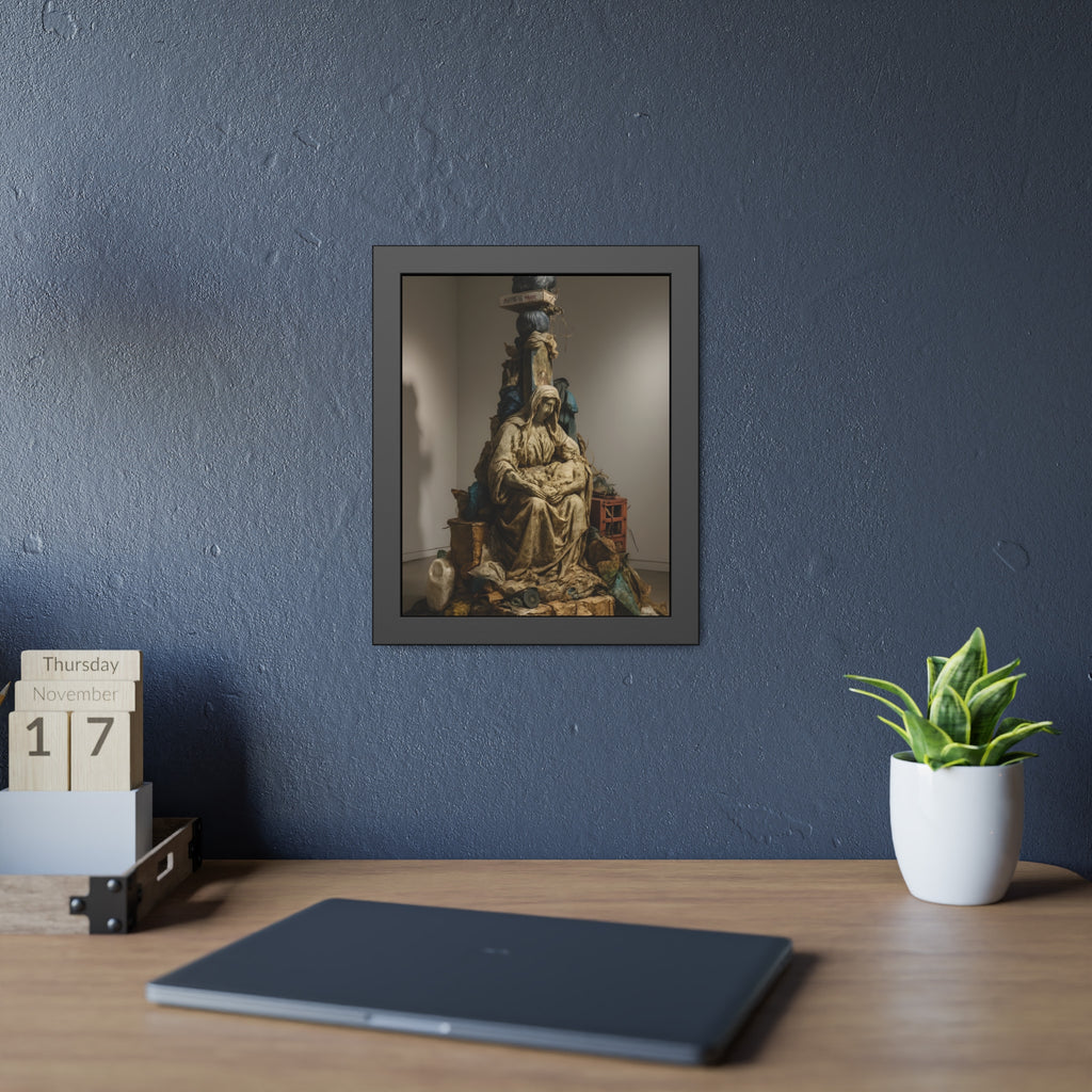 Seated hooded figure cradling a bundle on a mound of bagged refuse. Pietà of the Curbside by Garabaggio, framed fine art print hanging in a room.