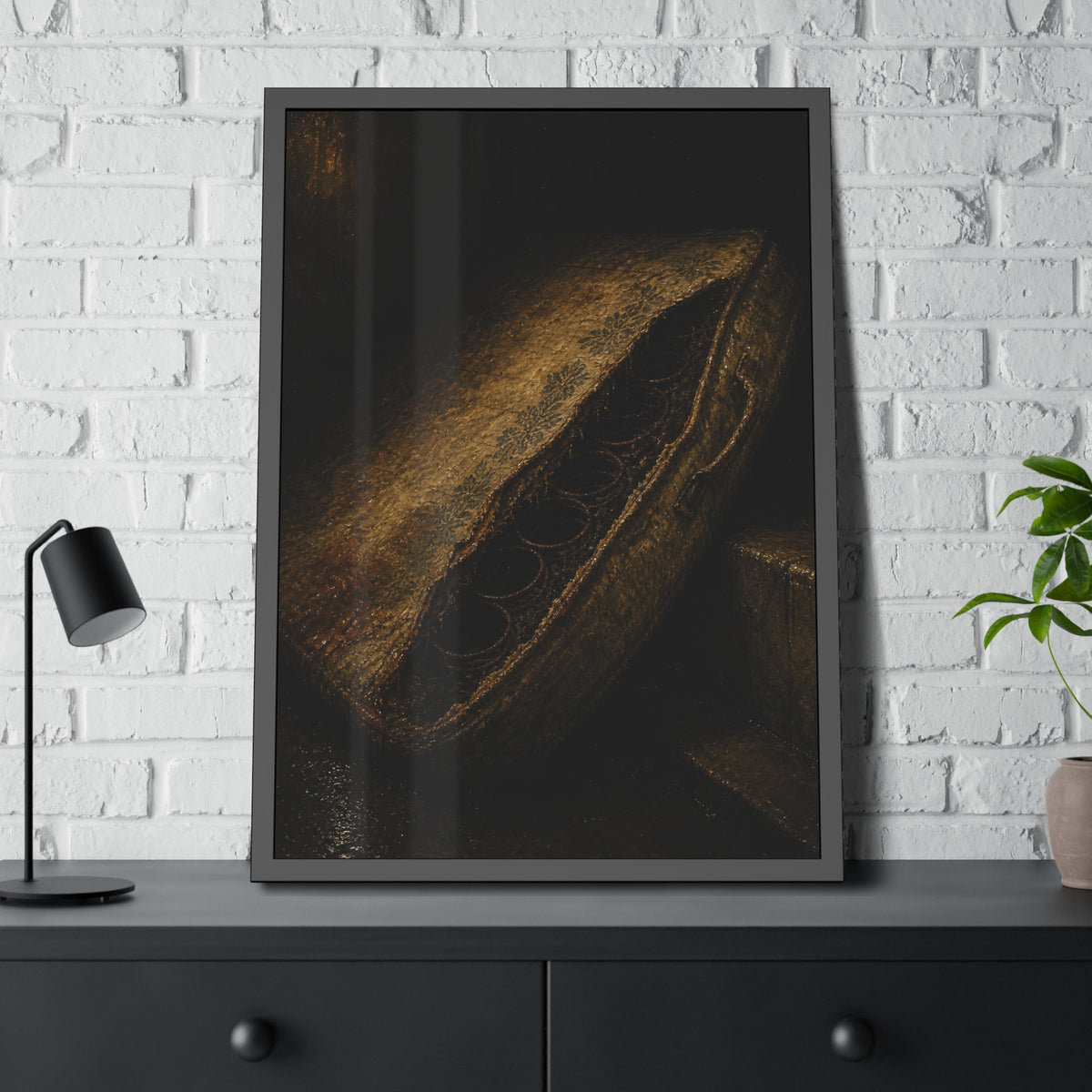 A torn mattress propped on its side, coil springs showing through the split. The Showing of the Springs by Garabaggio, framed fine art print hanging in a room.
