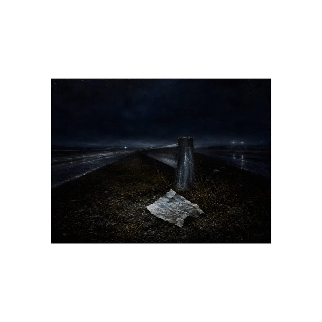 A sheet of paper on a grassy highway median beside a concrete post at night. The Resume on the Median by Garabaggio, fine art print, 16″ x 12″.