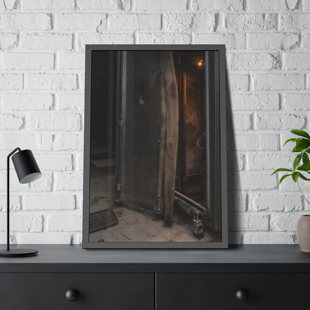 An open server rack cabinet with a mesh door and warm glow inside. The Heat Behind the Doors by Garabaggio, framed fine art print hanging in a room.