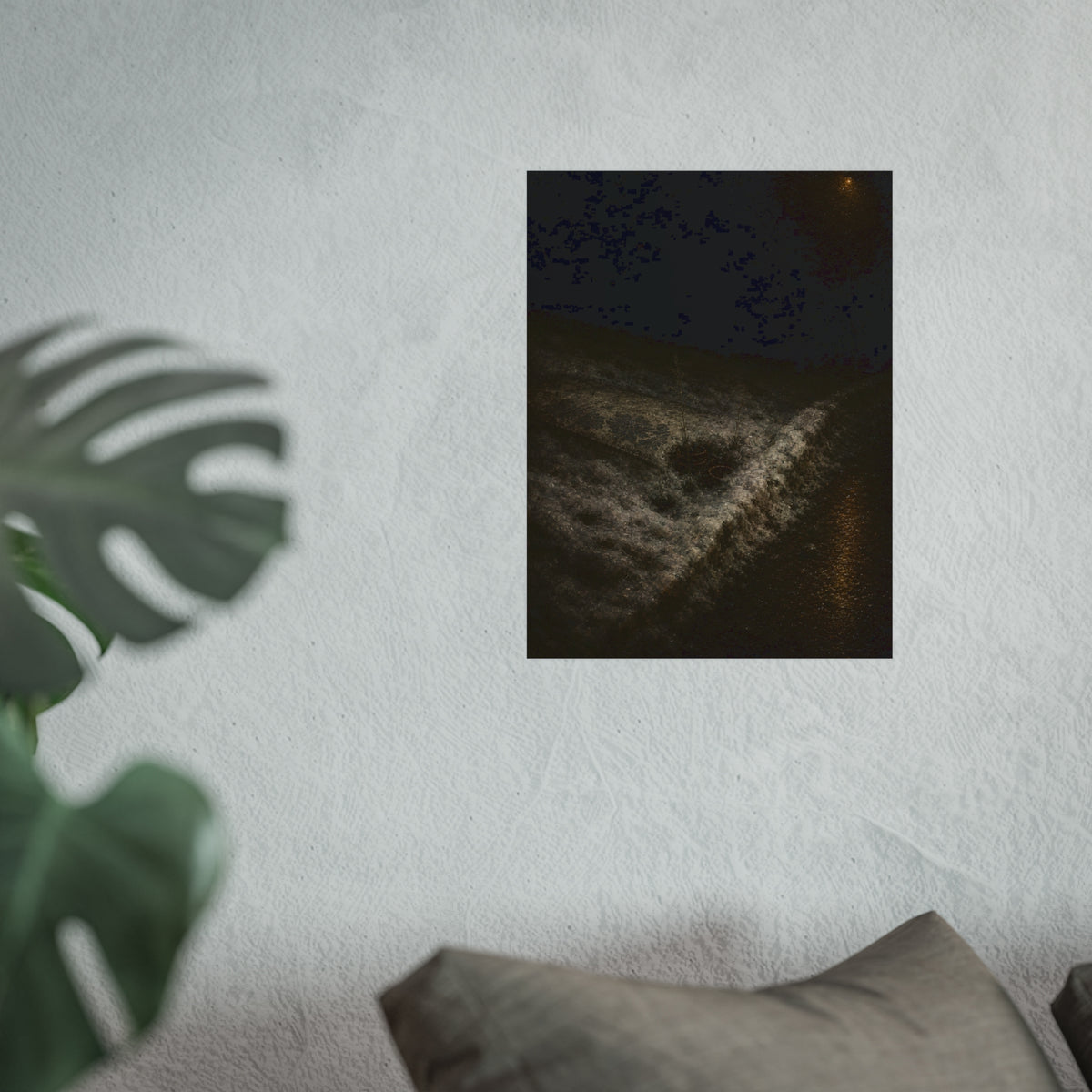 A discarded mattress half buried in snow, a distant streetlight behind. The White Burial by Garabaggio, fine art print hanging in a room.