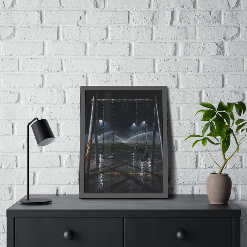 An empty swing set on wet asphalt, sprinklers arcing over the field. The Eleventh Hour: The Sprinklers by Garabaggio, framed fine art print hanging in a room.