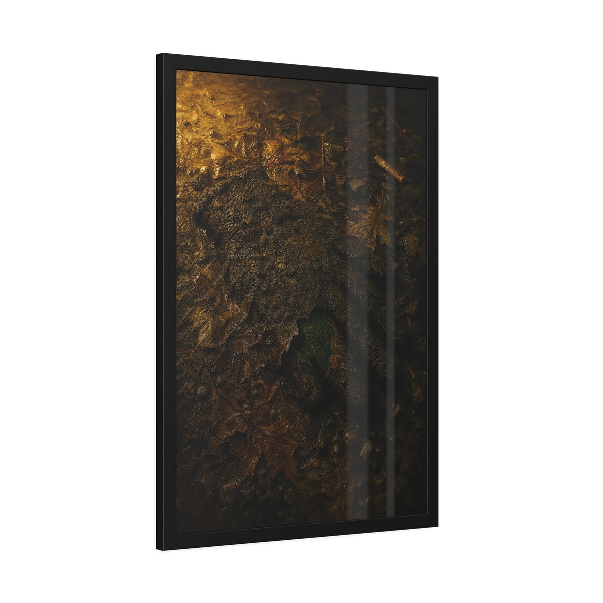 Wet mud and pressed oak leaves with a green scrap barely showing. The Reliquary of Mud and Leaf by Garabaggio, framed fine art print hanging in a room.
