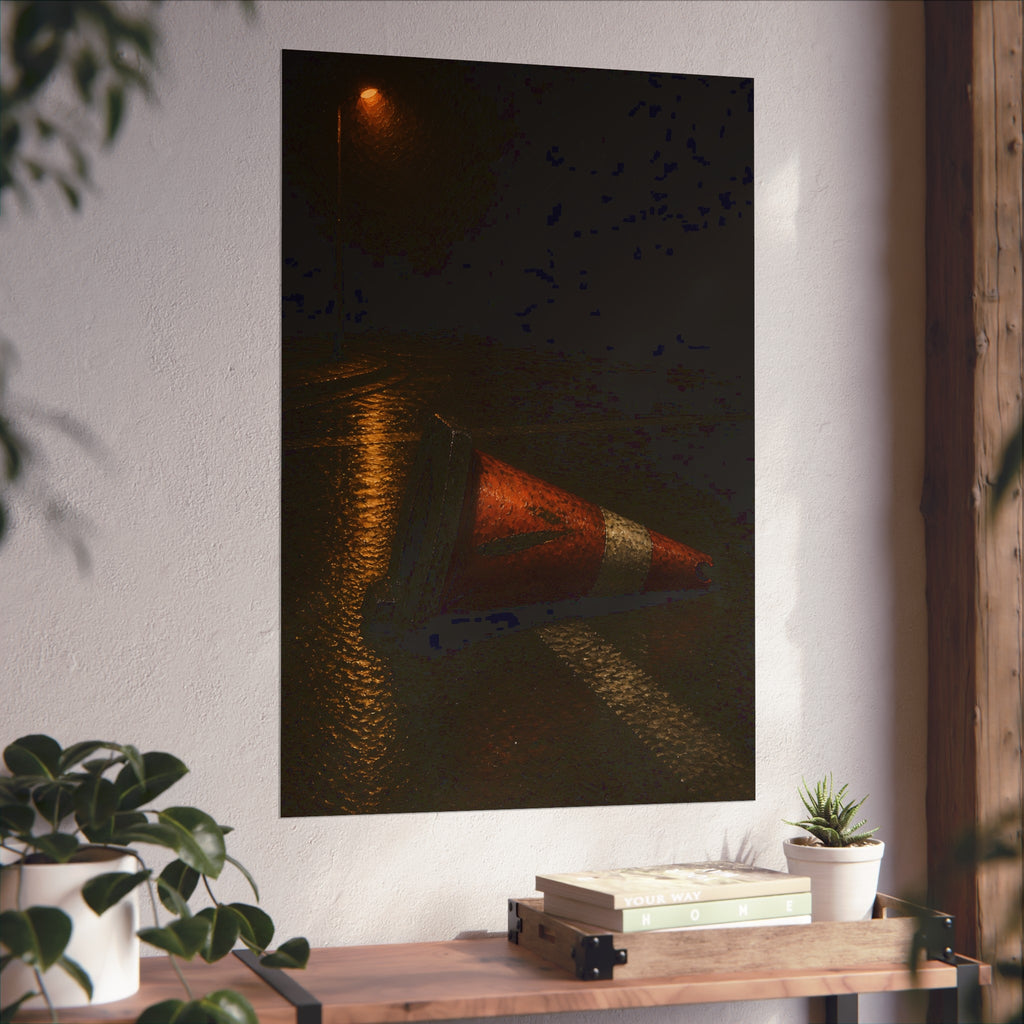 A toppled orange traffic cone on a wet road under a lone streetlight. The Taking by the Bumper by Garabaggio, fine art print hanging in a room.