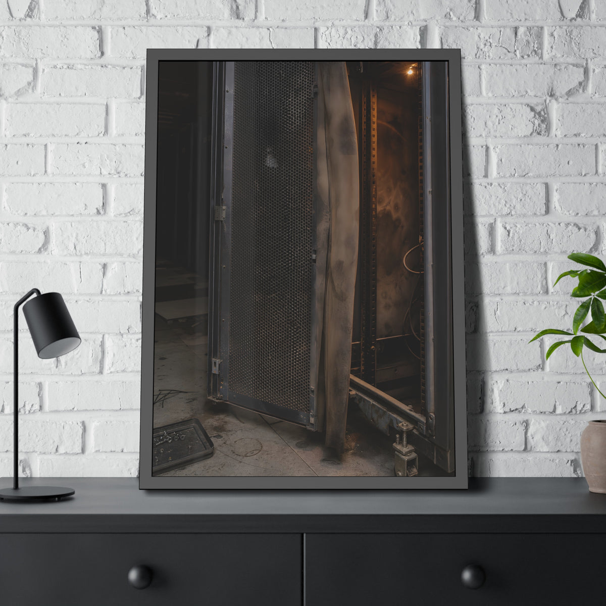 An open server rack cabinet with a mesh door and warm glow inside. The Heat Behind the Doors by Garabaggio, framed fine art print hanging in a room.