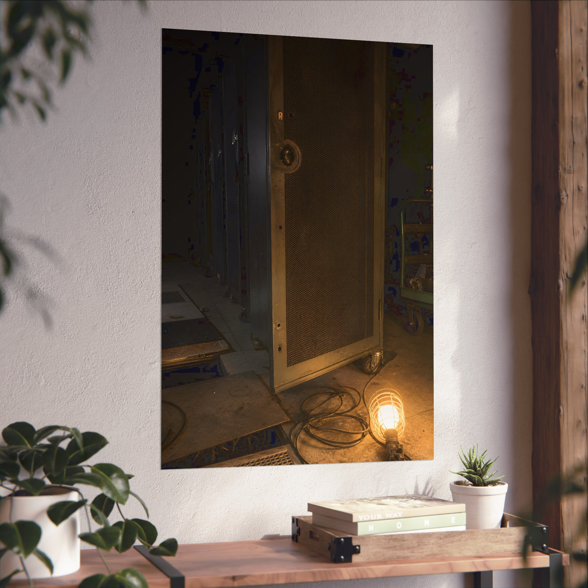 A perforated server rack door in a dark aisle lit by a floor work lamp. The Cold Aisle by Garabaggio, fine art print hanging in a room.
