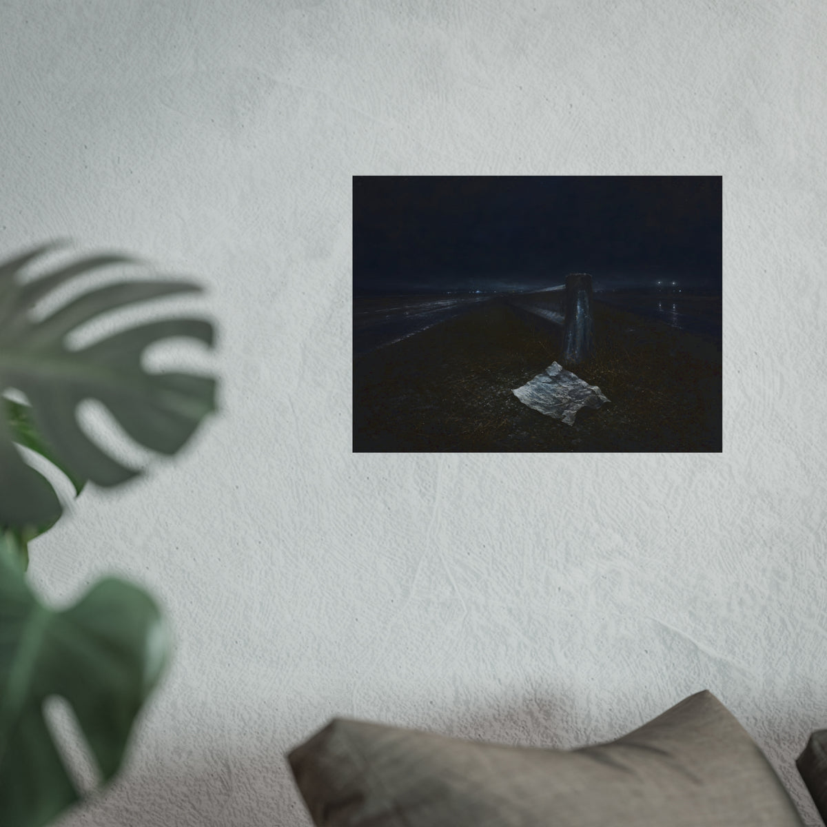 A sheet of paper on a grassy highway median beside a concrete post at night. The Resume on the Median by Garabaggio, fine art print hanging in a room.