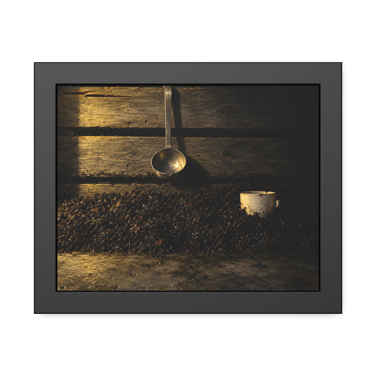"The Cup Half Out": A Garabaggio Framed Print