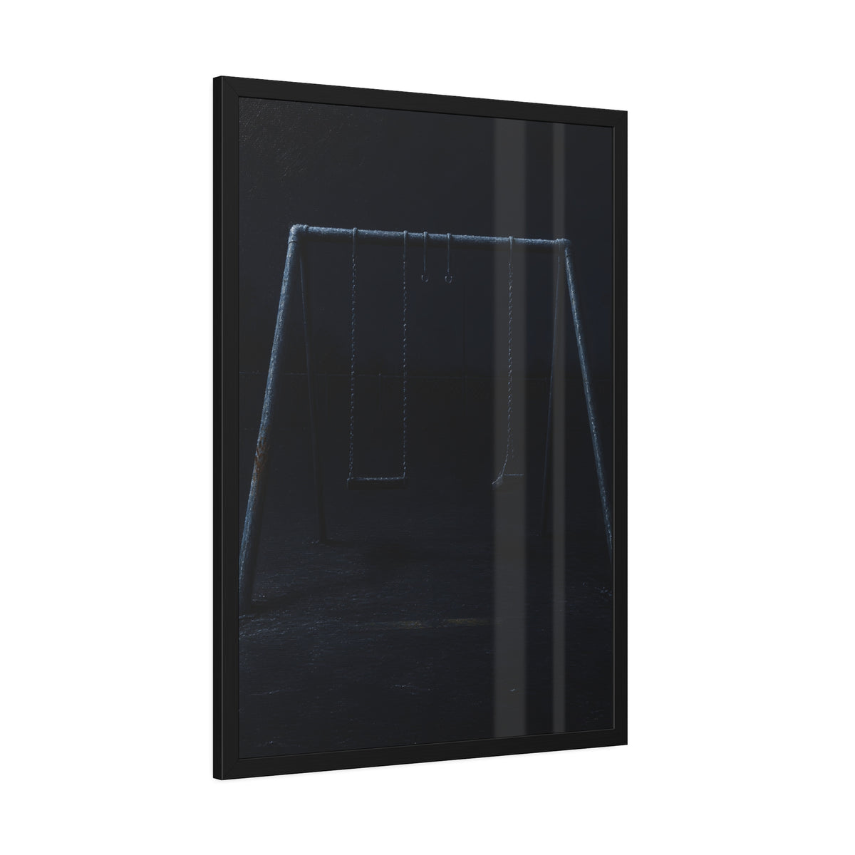 An empty swing set in near darkness with one seat twisted. The Fourth Hour: The Floodlights Cut by Garabaggio, framed fine art print hanging in a room.