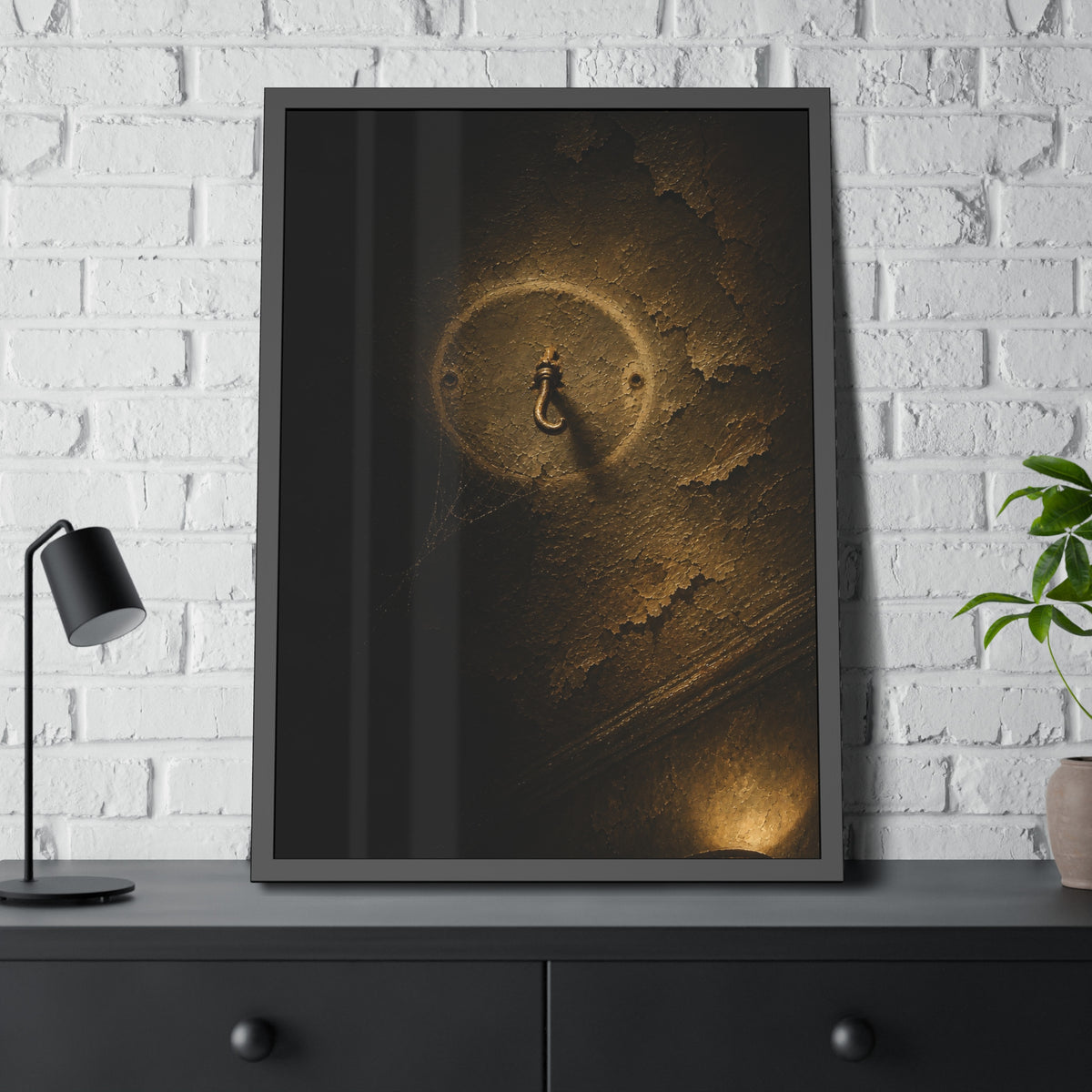 A small empty hook on a cracked ceiling, lit from one side. The Hook Without a Burden by Garabaggio, framed fine art print hanging in a room.