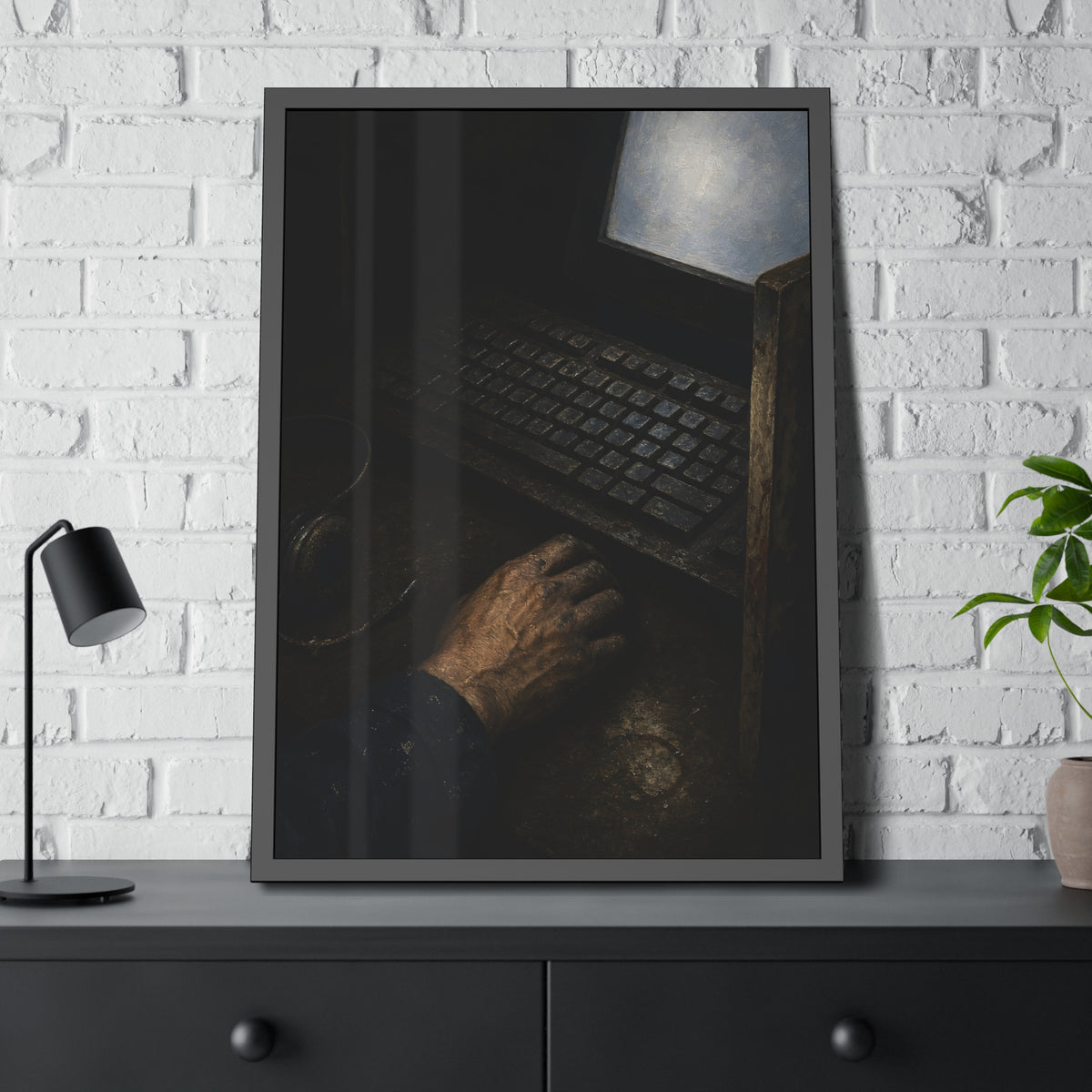 A hand on a mouse beside a grimy keyboard and a pale glowing screen. Login Before Dawn by Garabaggio, framed fine art print hanging in a room.