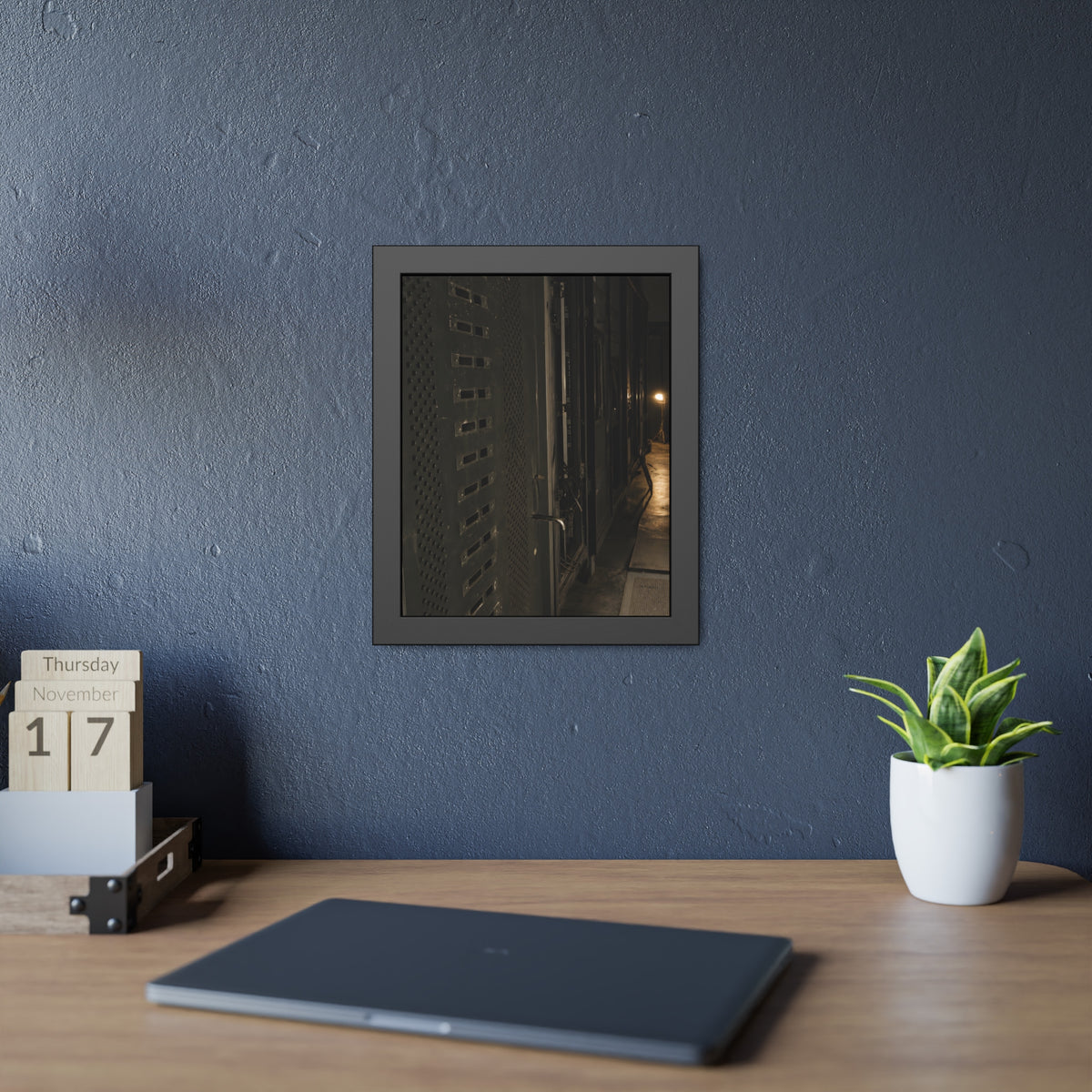Rows of dark server cabinets with one work lamp glowing far down the aisle. Racks Without Light by Garabaggio, framed fine art print hanging in a room.