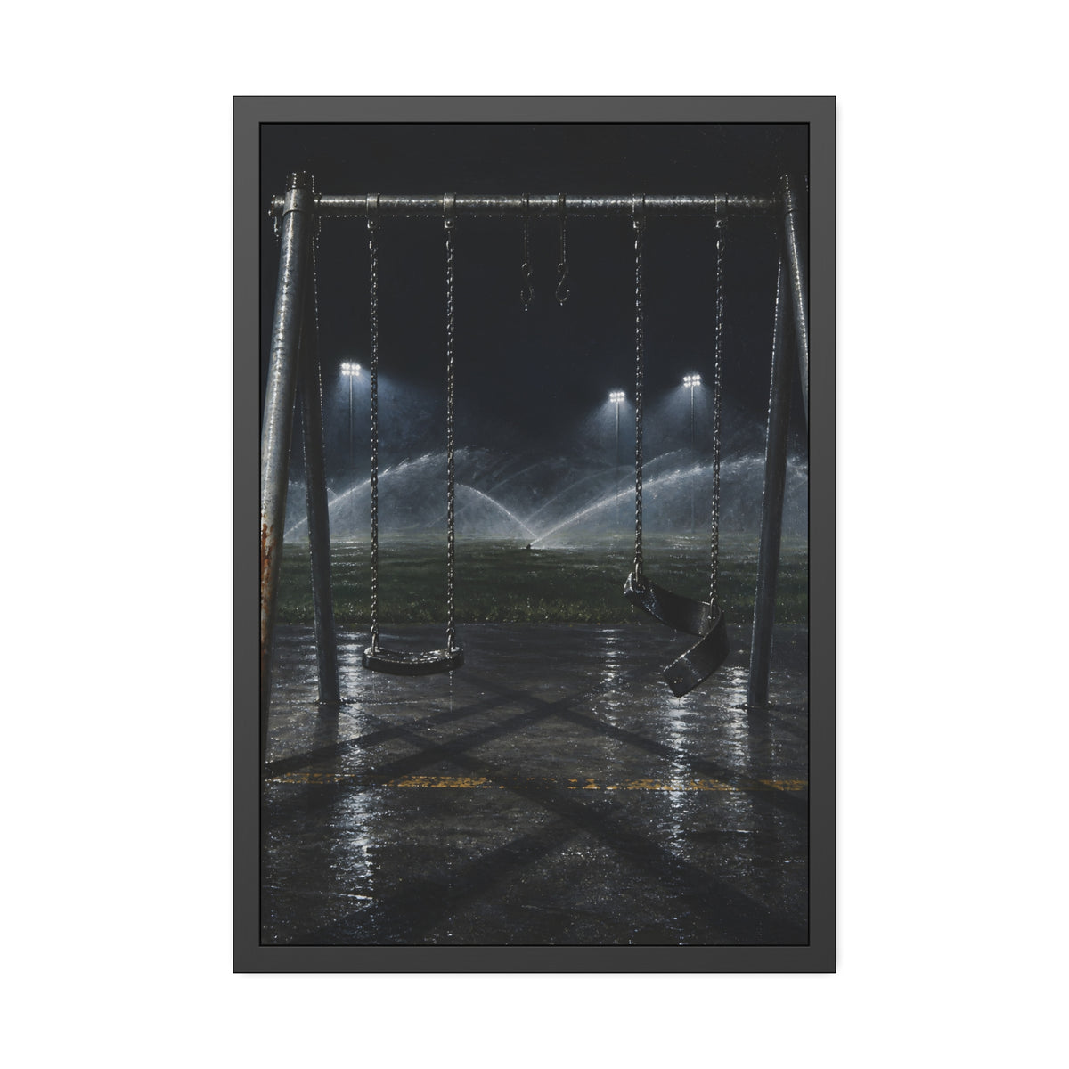 An empty swing set on wet asphalt, sprinklers arcing over the field. The Eleventh Hour: The Sprinklers by Garabaggio, framed fine art print, 24″ x 36″.