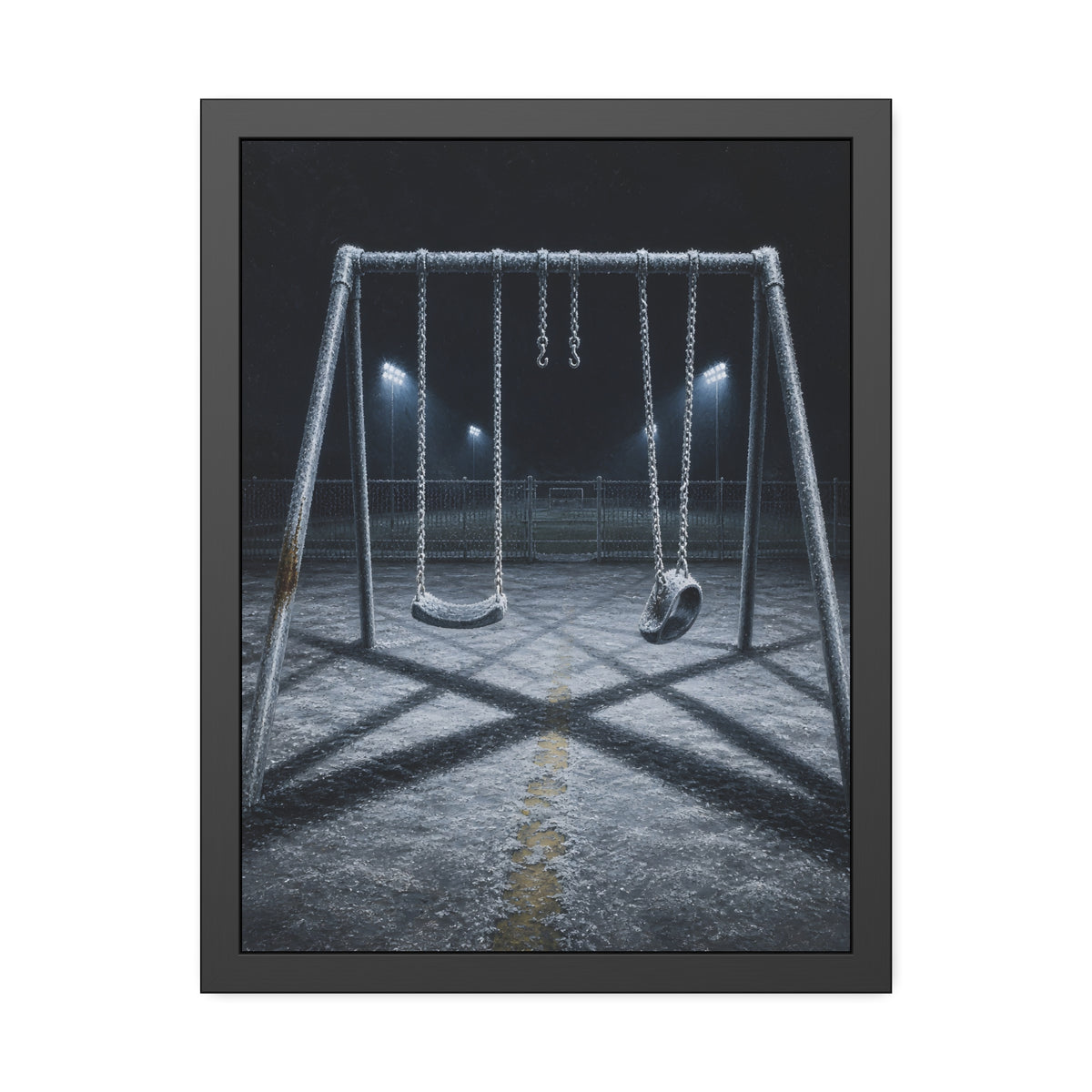 A frost covered swing set on empty asphalt under distant floodlights. The Third Hour: The Coldest Part by Garabaggio, framed fine art print, 18″ x 24″.
