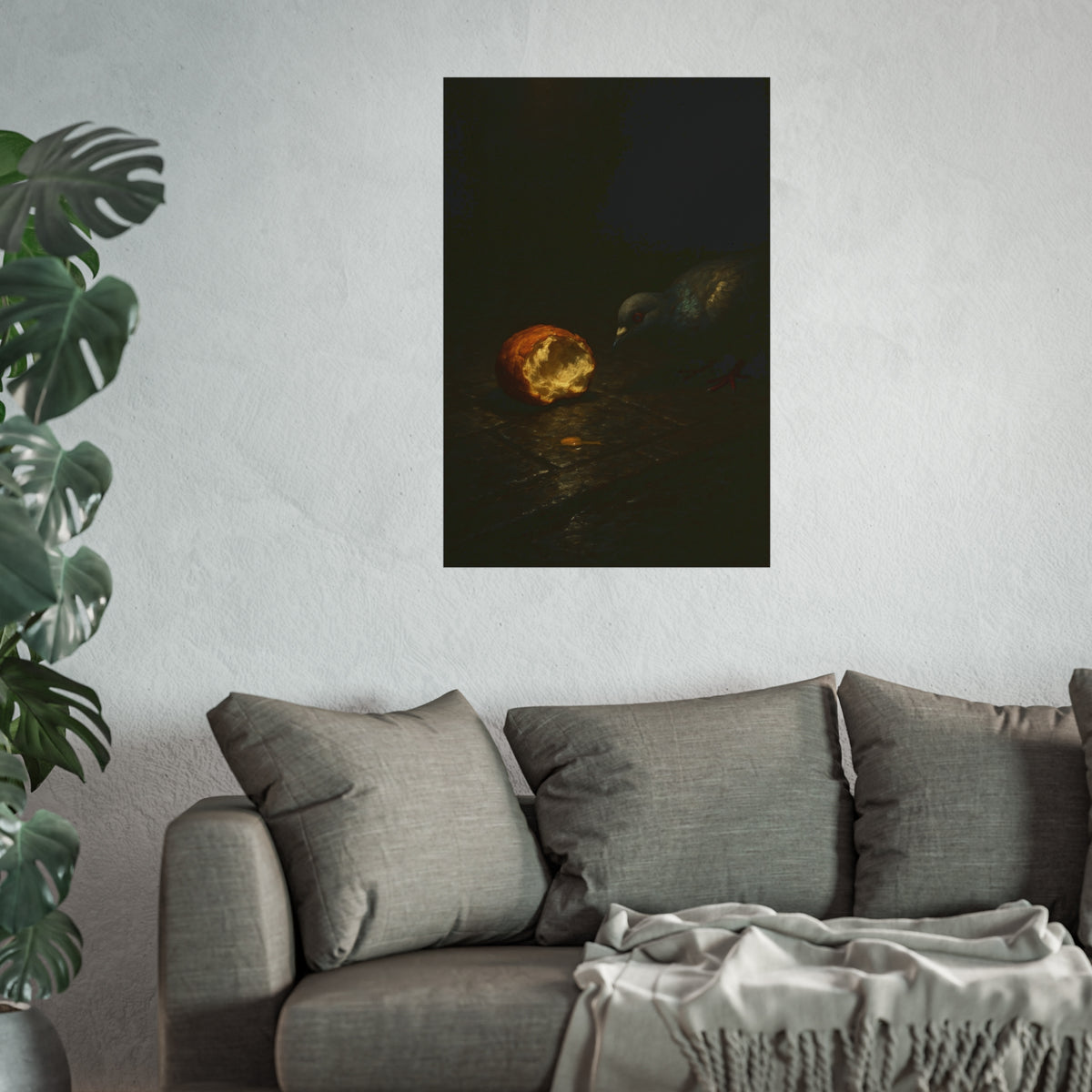 A pigeon leaning toward a torn bread roll on wet paving stones. The Offering of the Discarded Bun by Garabaggio, fine art print hanging in a room.