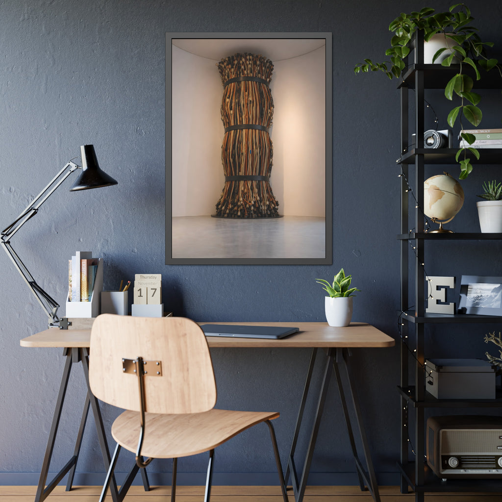 A tall column of bundled cords strapped in three places in a gallery corner. The Bundled Apse by Garabaggio, framed fine art print hanging in a room.