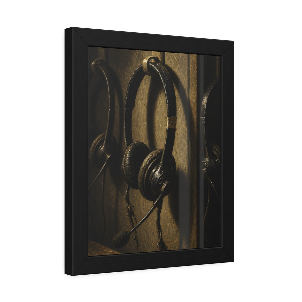 Three worn call center headsets hanging on wall hooks in dim light. The Headsets Left Hanging by Garabaggio, framed fine art print hanging in a room.
