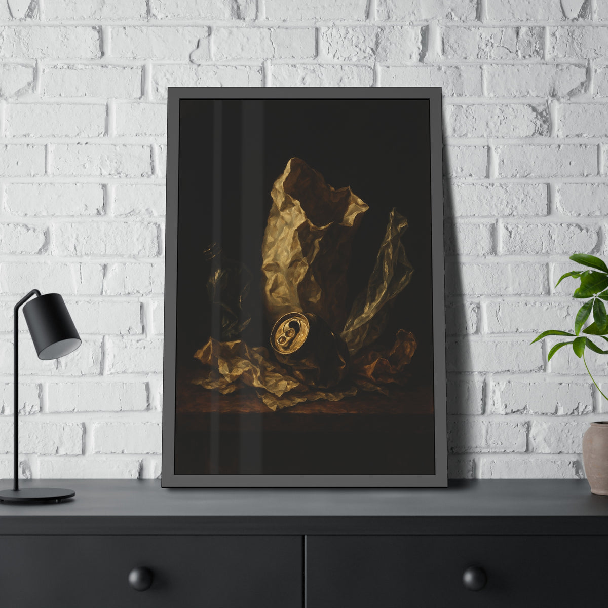 A crushed paper bag, dented can and flattened bottle on a dark table. Vanitas with Crumpled Bag by Garabaggio, framed fine art print hanging in a room.