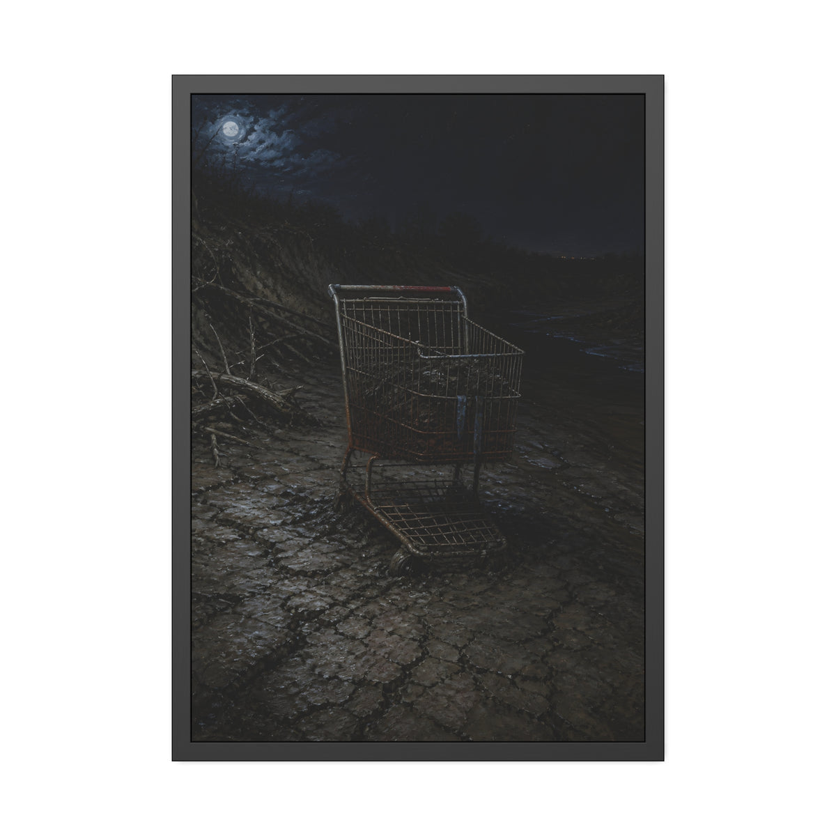 A rusted shopping cart sunk in cracked dried mud under a full moon. The Silting by Garabaggio, framed fine art print, 28″ x 40″.