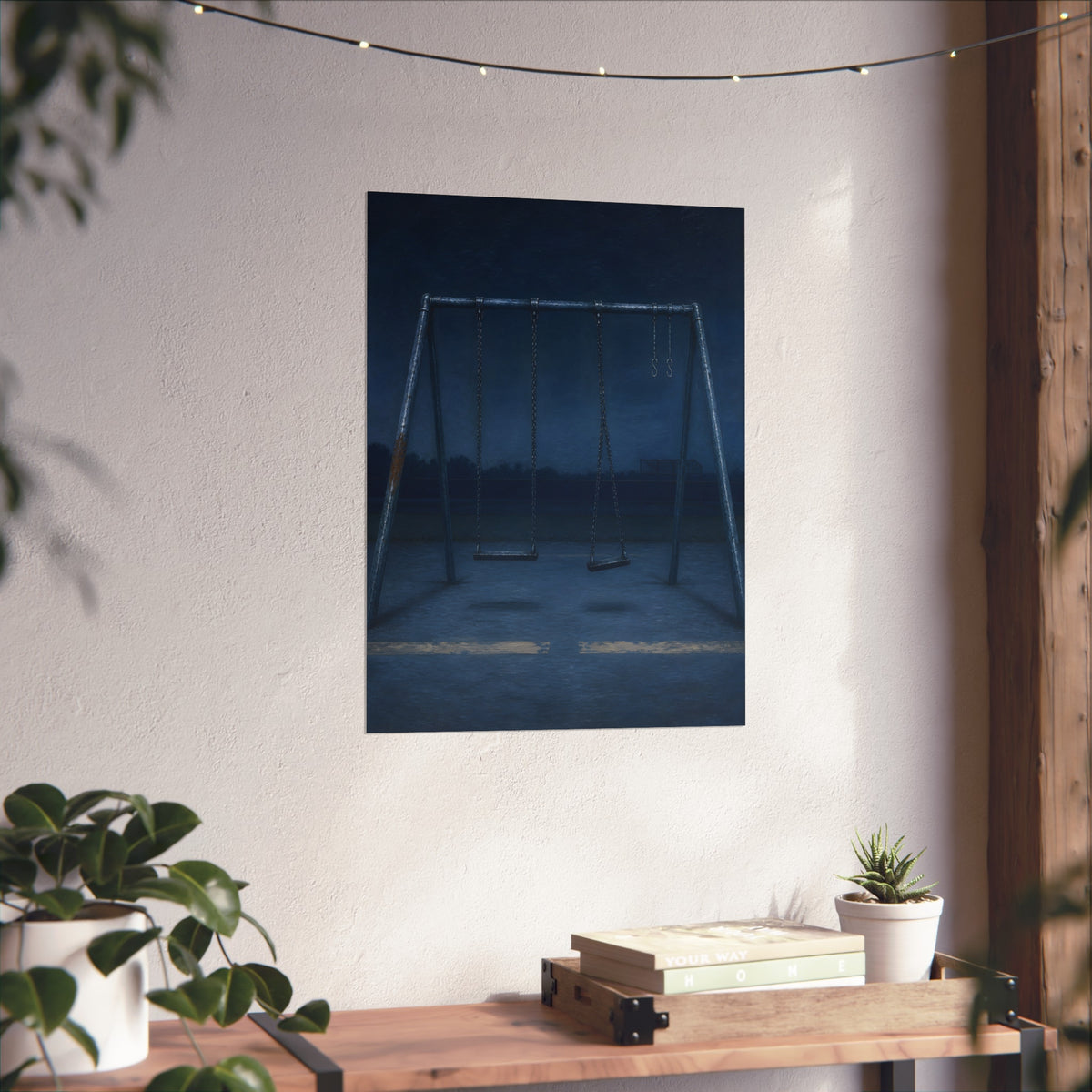 A swing set with two seats and two bare hooks in blue predawn light. The Fifth Hour: The Blue Before by Garabaggio, fine art print hanging in a room.
