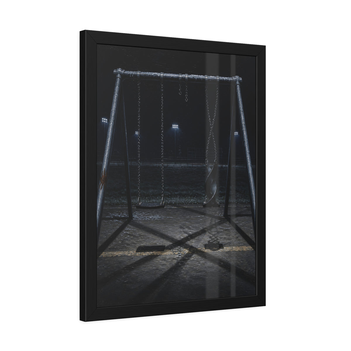 An empty swing set at night with one seat twisted up on its chains. The First Hour: The Twisted Seat by Garabaggio, framed fine art print hanging in a room.