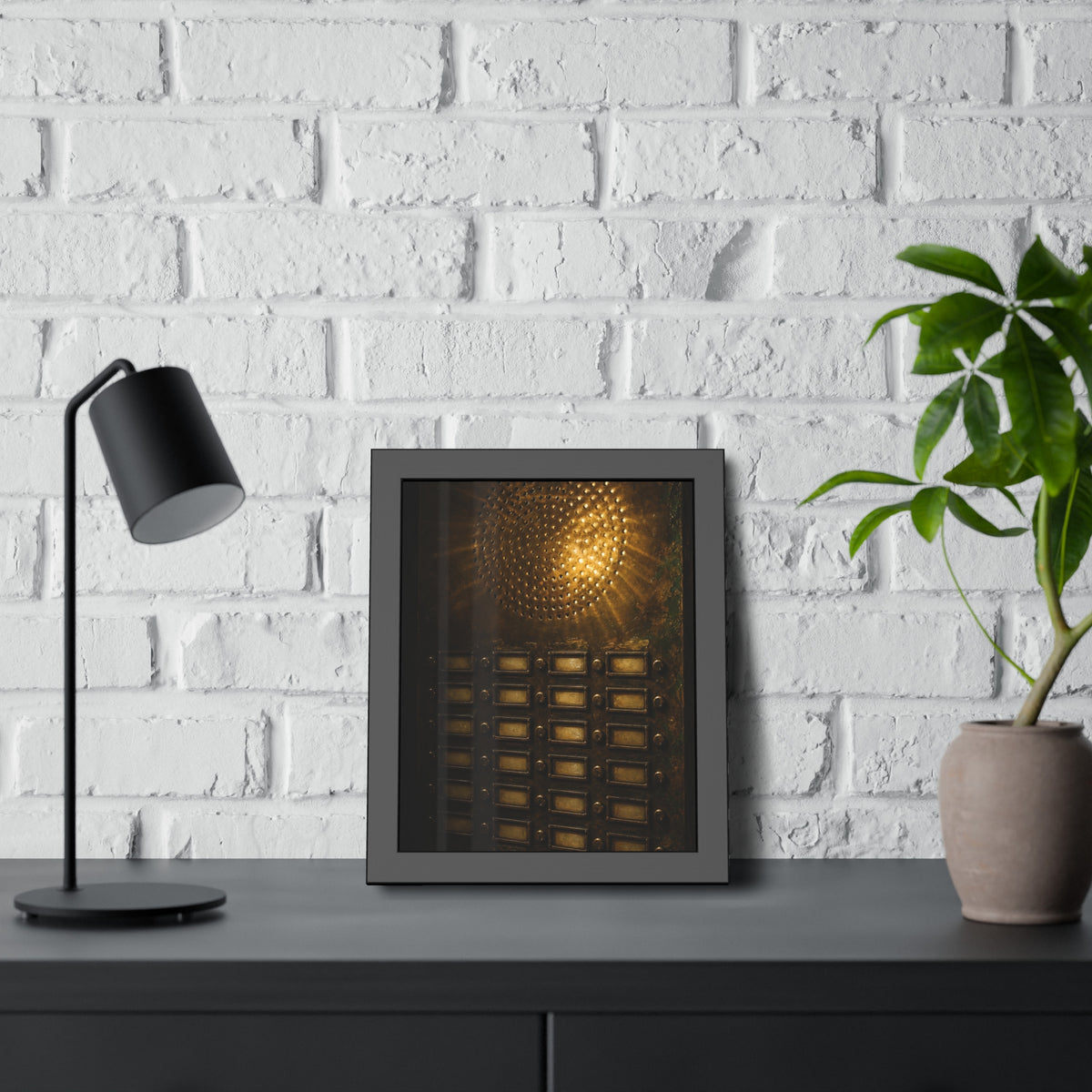 Light glowing through an intercom speaker grille above rows of buttons. Voice Through Perforations by Garabaggio, framed fine art print hanging in a room.