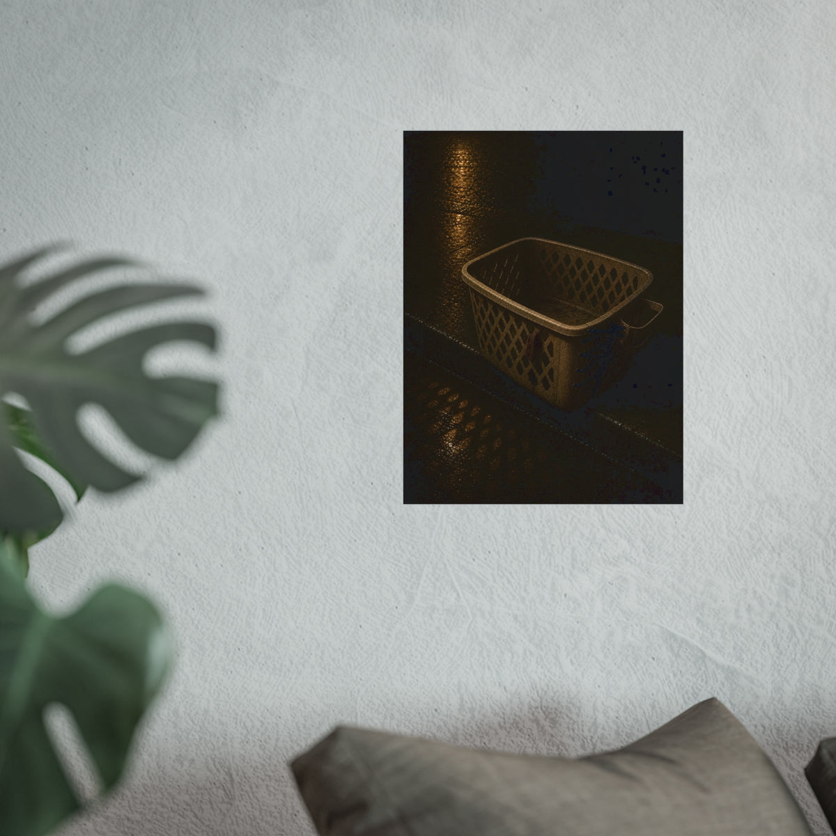 An empty plastic laundry basket on a wet curb under warm street light. The Emptying at the Curb by Garabaggio, fine art print hanging in a room.