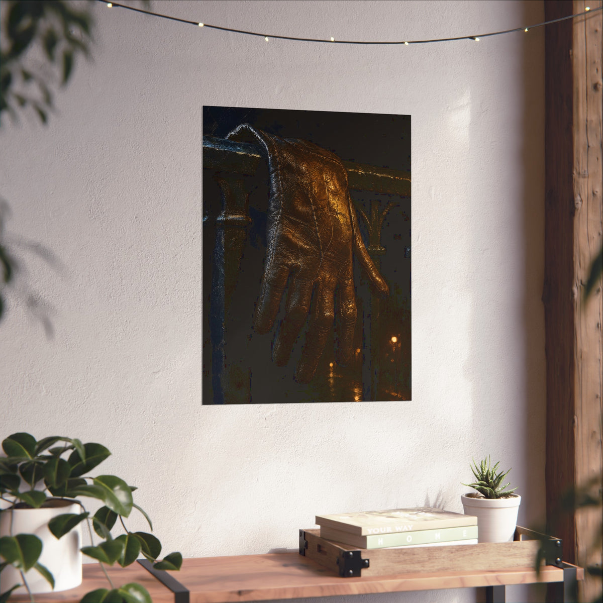 A leather glove draped over an iron railing, fingers hanging. The Repose of the Leather Glove, No. 1 by Garabaggio, fine art print hanging in a room.