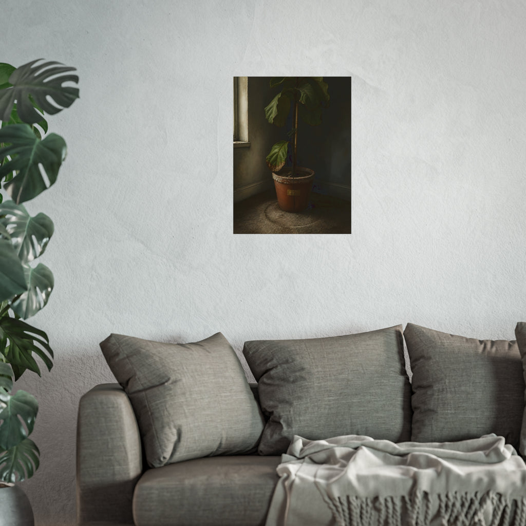 A leafy potted fig staked to a cane in a taped clay pot beside a window. The Corner by the Window by Garabaggio, fine art print hanging in a room.