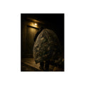 A man carrying a huge bag of bottles past a lit doorway at night. The Bag Carried Before Dawn by Garabaggio, fine art print, 12″ x 16″.