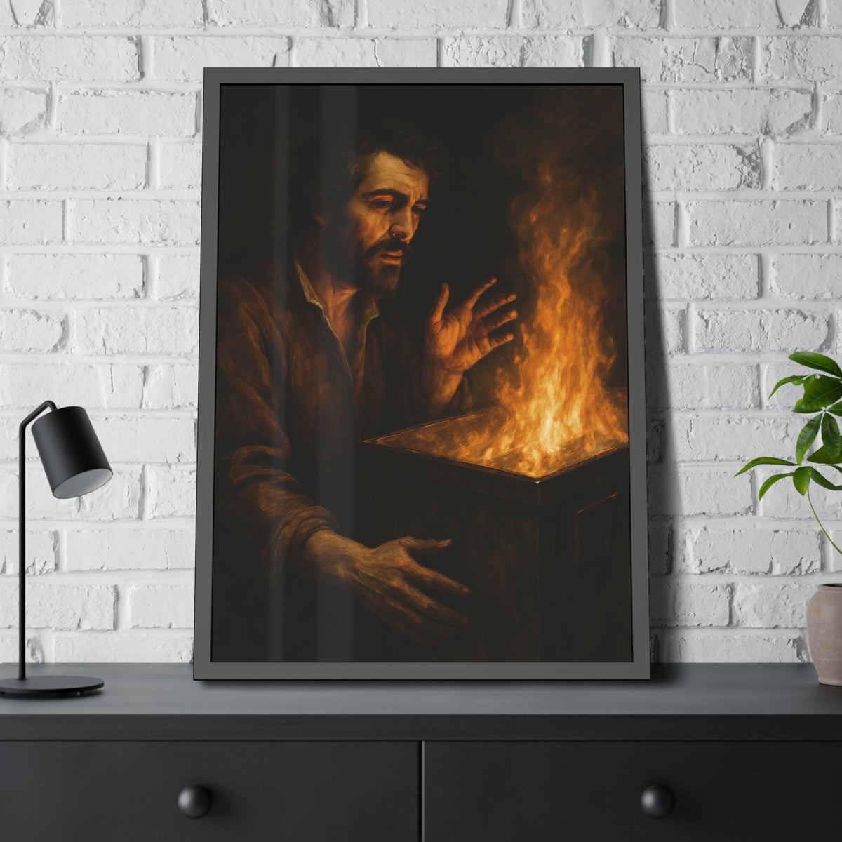 Man holding both hands toward the flames of a burning dumpster. Self-Portrait Warming the Hands by Garabaggio, framed fine art print hanging in a room.