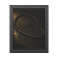 A bent bicycle wheel rim with loose spokes on a dark table in warm light. The Cutting of the Circle by Garabaggio, framed fine art print, 11″ x 14″.