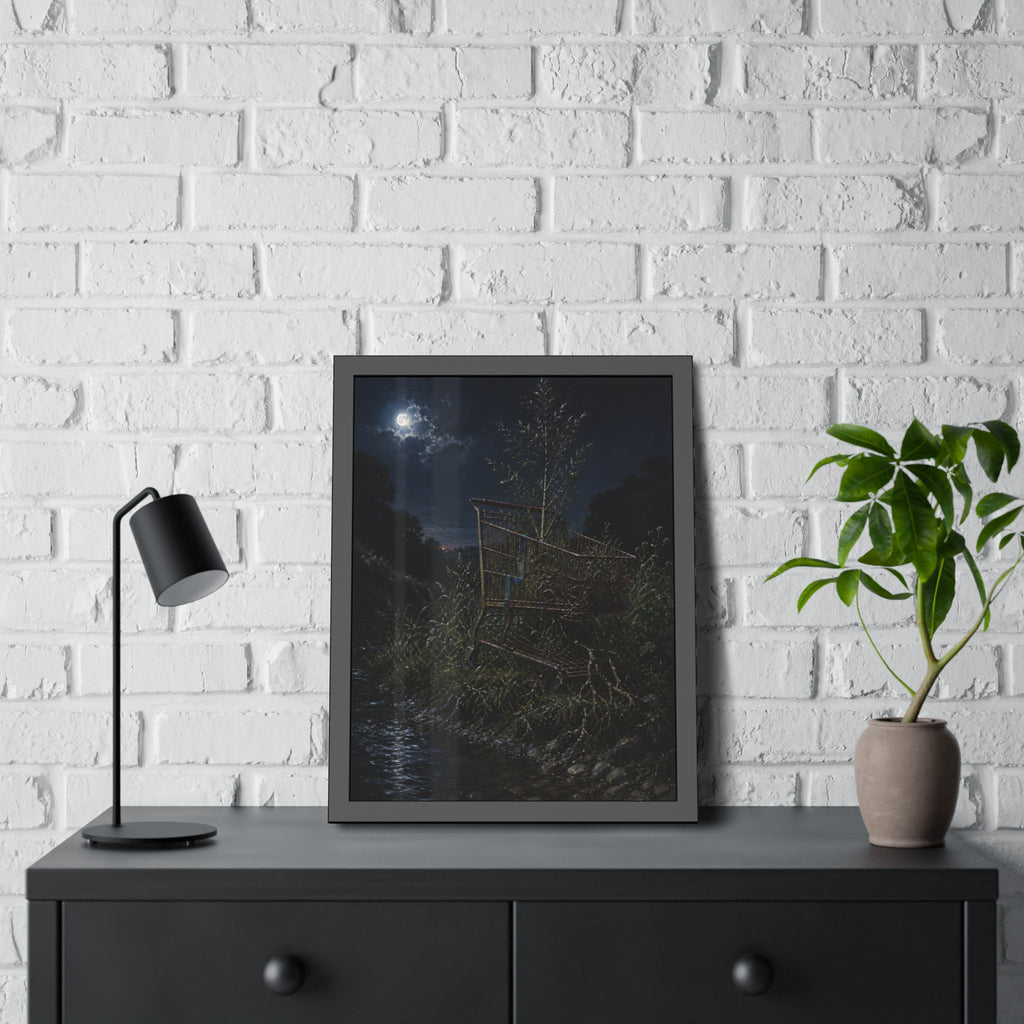 A shopping cart in creekside weeds with a sapling growing up through it. The Cart Grown Through by Garabaggio, framed fine art print hanging in a room.